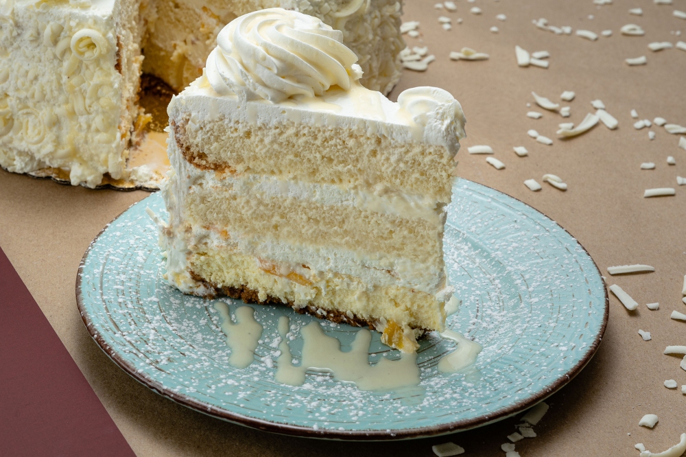 Rebanada de Pastel Tres Leches con Queso