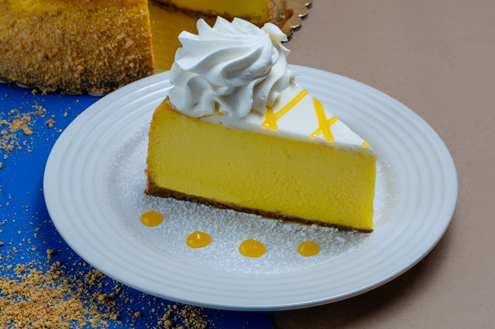 Rebanada de Pastel Queso con Mango